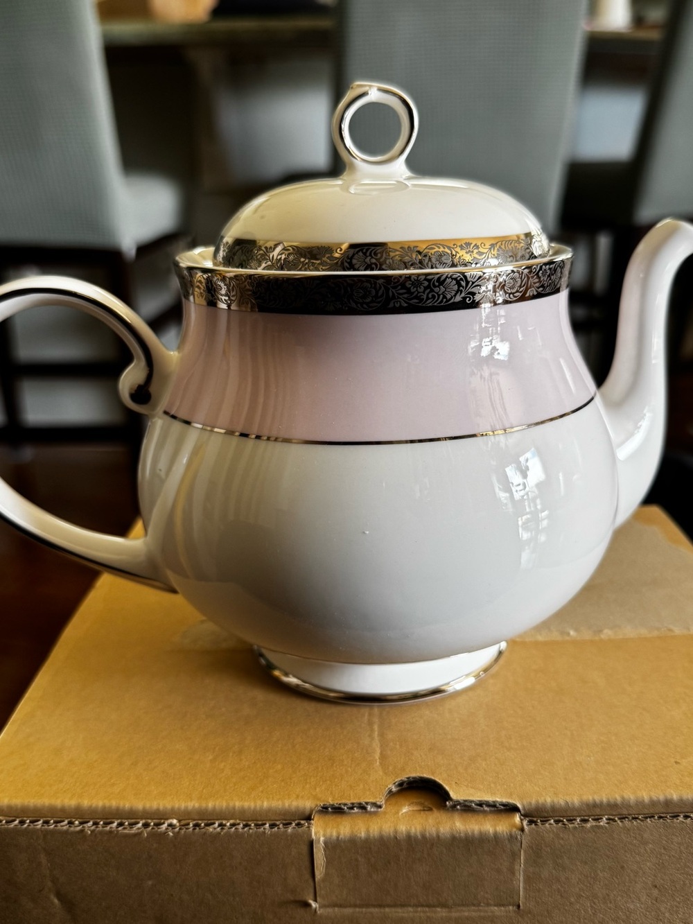 Mary Kay 40th Anniversary teapot featuring a pink and platinum design.